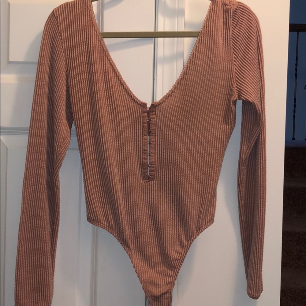 Blush/pink bodysuit from urban outfitters size M